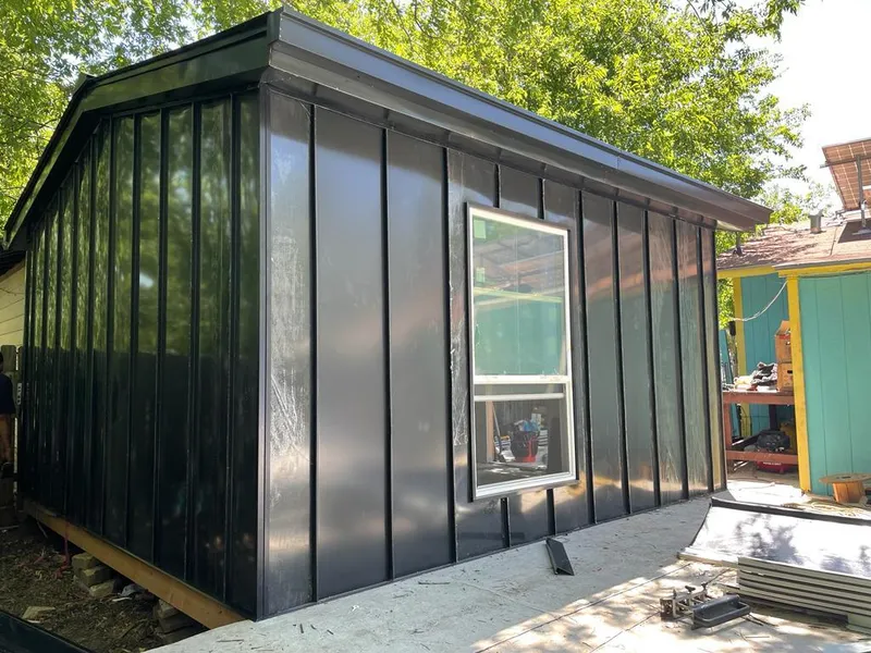 Black standing seam metal wall panels for Metal Roof Installation in Glencoe